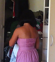 Asian wife getting dressed