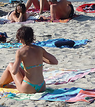 Nice girl in thong on the beach