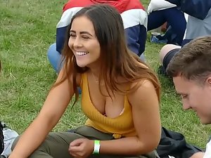 Big boobs of happy brunette on the festival