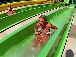 Bikini top falls off on the water slide