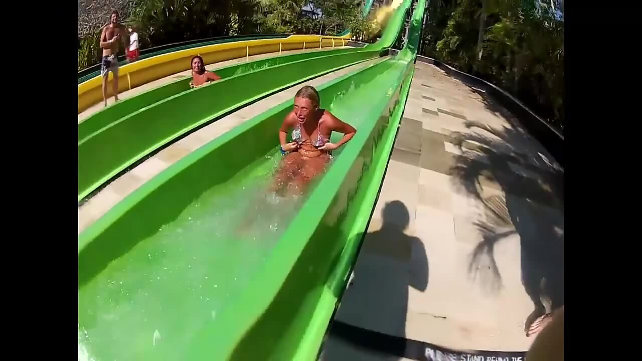 Bikini top falls off on the water slide - Voyeurs HD 