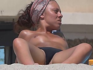 Pussy slip of african beauty on beach