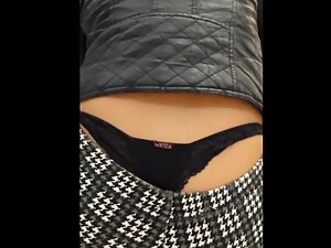Sexy thong slips out of tight checkered pants