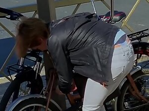 Bicyclist girl unintentionally shows her thong