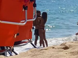 Quick look at lucky guy with a stunning girlfriend on the beach