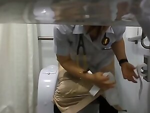 Spying on a cute nurse while she is peeing in the hospital