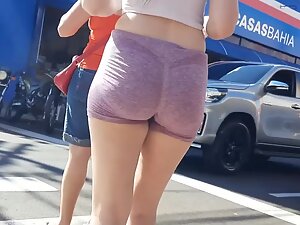 Inspection of hot bubbly ass in shorts on road crossing