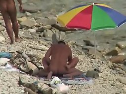 Sex under a beach umbrella