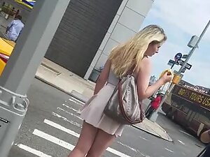 Wind lifts teen blonde's skirt and shows her ass