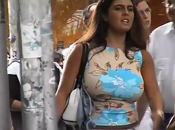 Big boobs bounce while she walks