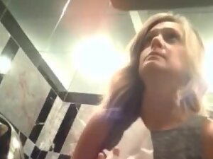 Neat pussy of a lovely lady caught by hidden cam in toilet