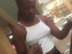 Black girl's hard nipples and tits without a bra