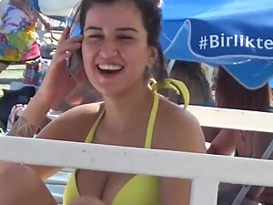 She enjoys the beach as much as we enjoy her big boobs