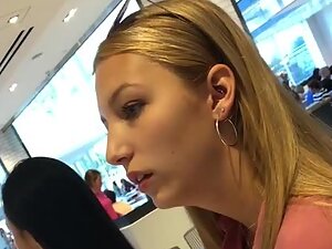 Sexy slim blonde with big earrings