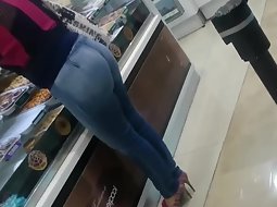 Milf with a sexy ass in the store