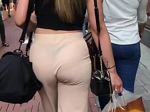 Chunky ass and black thong in beige pants