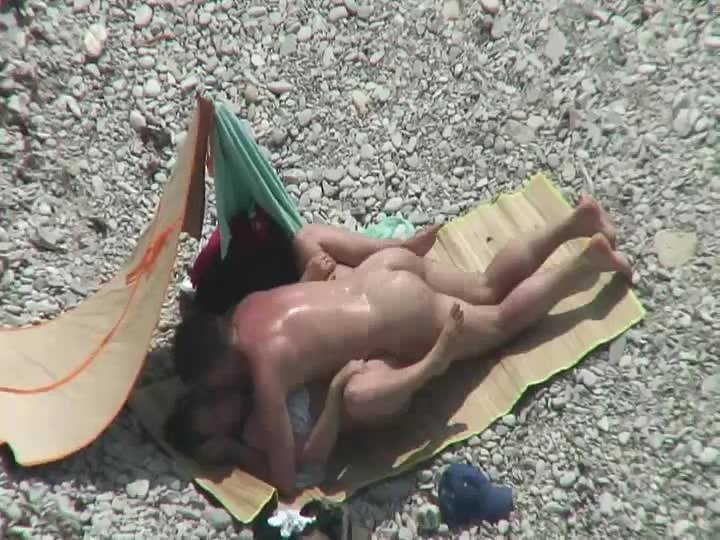 Nudists fucking on the beach - Voyeurs HD
