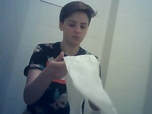 Spying on tomboy's hot shaved pussy in toilet