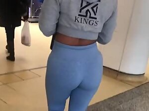 Ass in blue leggings looks like it is made of jello