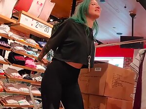 Tattooed salesgirl does a sexy dance in front of voyeur