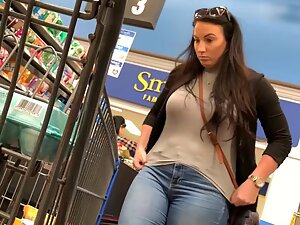 Pretty big woman checked out at cashier