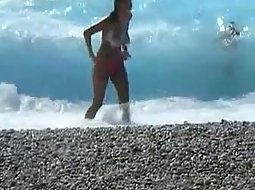Wave almost fully undressed her