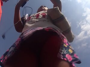 Upskirt of big pussy bulge while she hands flyers