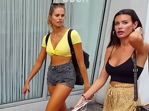 Two seductive hot friends walking together