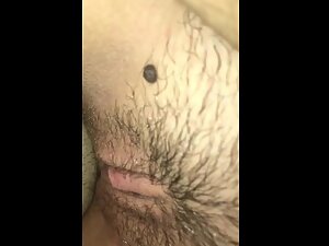 Showing her pretty hairy pussy while she rides my dick