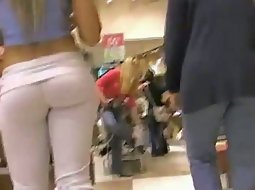 Sexy lady in the shoe store