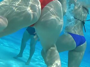 Close underwater view of teen girl in red bikini