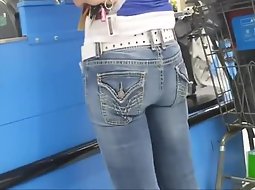 Following a cute butt in tight jeans