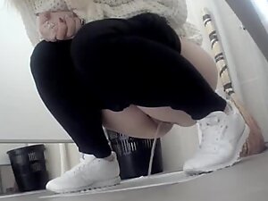 Looking hot from hidden camera angle while she is pissing