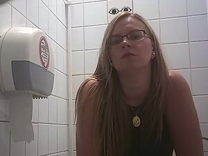 Spying on woman that looks like a school teacher while peeing