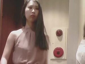 Spying on elegant asian girl while she is peeing