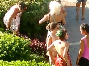 Lots of girls peeing by the bushes during festival