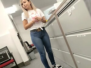 Coworker's kissable face and awesome ass in tight jeans