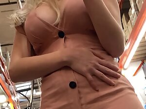 Blonde's big boobs and nipples visible in dress