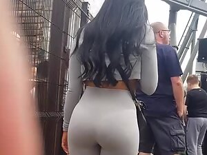 Waiting behind this black haired beauty is never boring