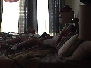 Hidden cam caught her smoke cigarette and rub pussy in bedroom