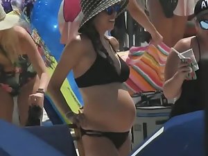 Gorgeous pregnant woman on the beach