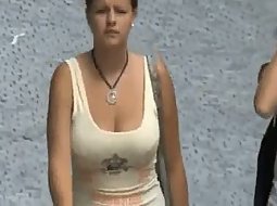 Big boobs bouncing on the street