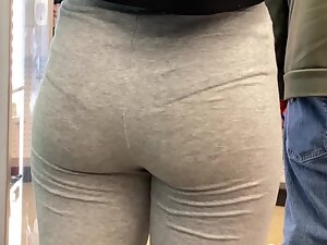 Studying her round ass and sexy thong outline