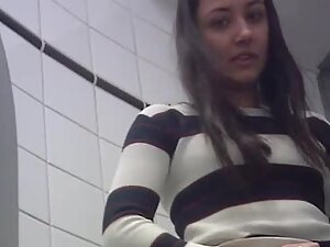 Hidden camera discovers pretty girl's sexy side in toilet