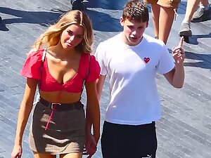 Lucky boy walks with his perfect girlfriend