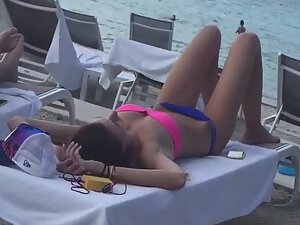 Hot tiny ass and bikini bridge when she lies down