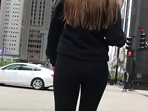 Hipster girl with round ass in tight black leggings