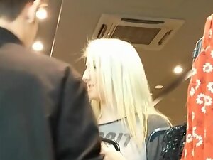 Upskirt of blonde's pussy bulge in thong