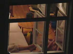 Peeping on naked neighbor through the window