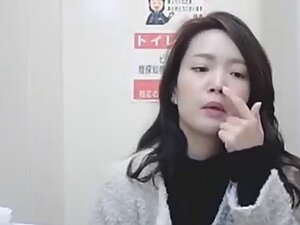 Asian girl's hairy bush got wet from peeing